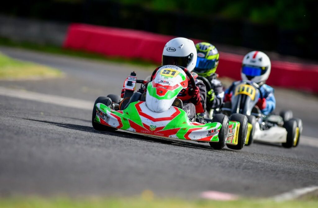 several karts racing in line